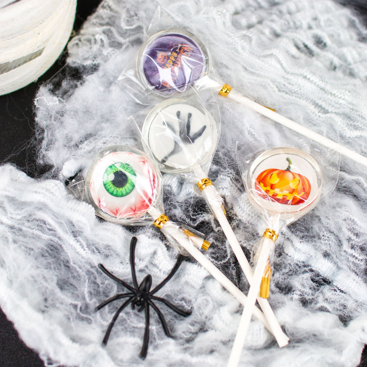 Halloween Lollis mit Spinnendeko