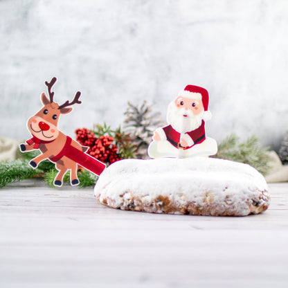 Fondant Kuchen-Einstecker Weihnachtsmann mit Rentier im Stollen als Schlitten