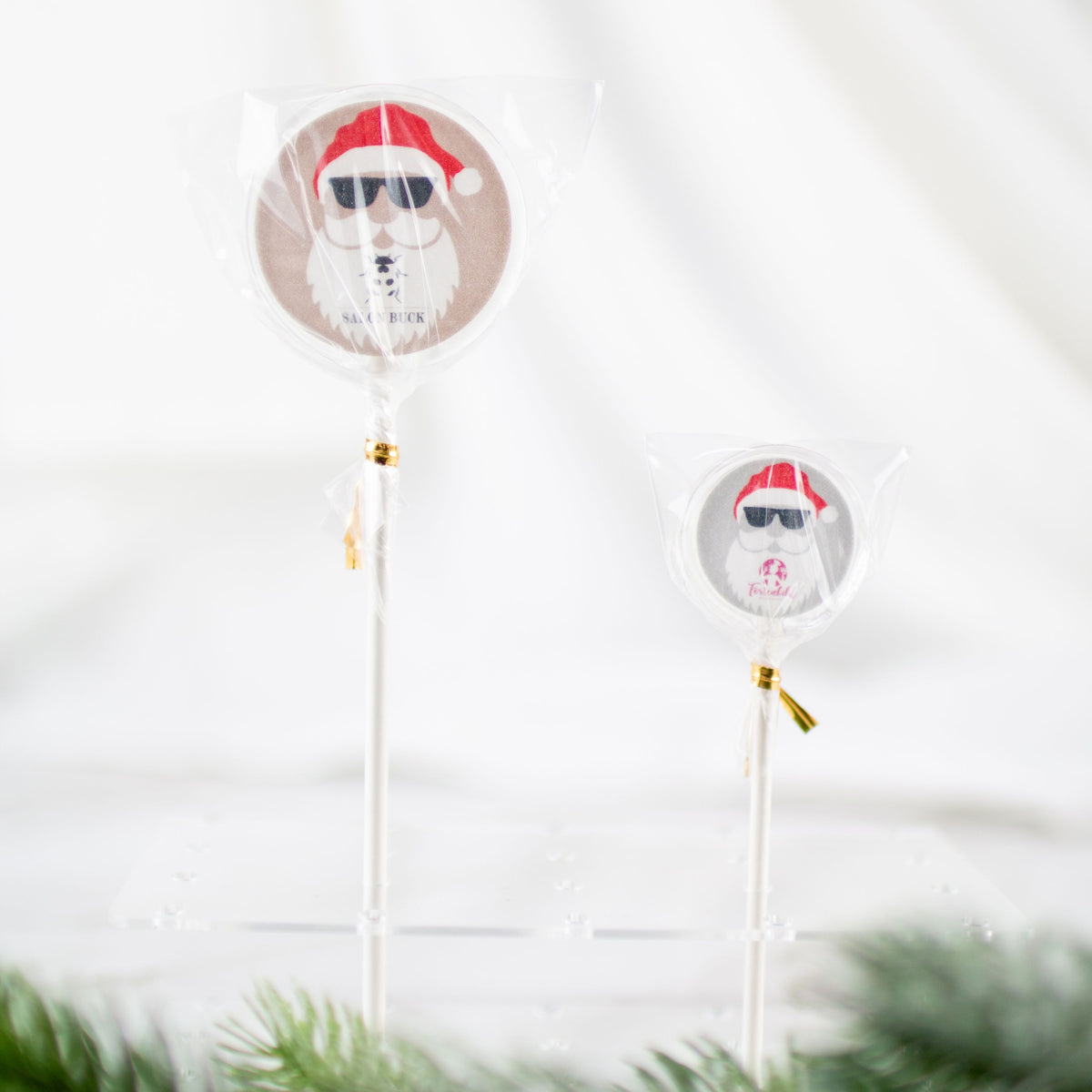 Motivlolli Crazy Santa mit Logo Größenvergleich 3cm und 5cm Lolli