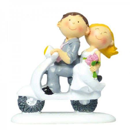 Bride and groom on scooter